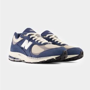 NEW BALANCE 2002R IN BLUE / CREAM size 7.5 women’s (5.5 men’s)